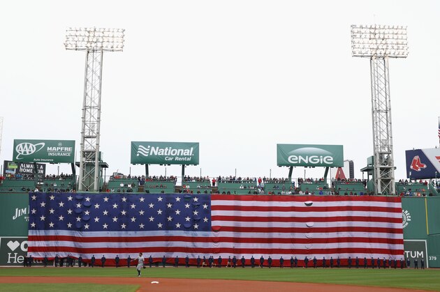 BOSTON, MA - MAY 28:  The American Flag hangs from the Green Monster before the game between the Boston Red Sox and the Toronto Blue Jays at Fenway Park on May 28, 2018 in Boston, Massachusetts. MLB Players across the league are wearing special uniforms to commemorate Memorial Day.  (Photo by Omar Rawlings/Getty Images)
