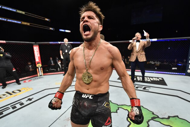 JACKSONVILLE, FLORIDA - MAY 09: Henry Cejudo celebrates after his knockout victory over Dominick Cruz in their UFC bantamweight championship fight during the UFC 249 event at VyStar Veterans Memorial Arena on May 09, 2020 in Jacksonville, Florida. (Photo by Jeff Bottari/Zuffa LLC)