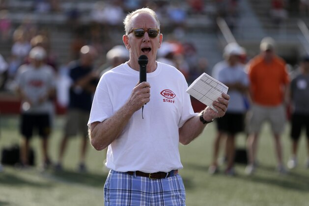 Former NFL quarterback Archie Manning, father of Eli and Peyton Manning, addresses campers at the start of the Manning Passing Academy on the Nicholls State University campus in Thibodaux, La., Thursday, July 10, 2014. (AP Photo/Gerald Herbert)
