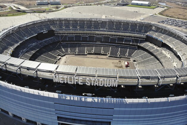 An empty MetLife Stadium in East Rutherford, New Jersey, is seen from the air on Monday, April 6, 2020. (AP Photo/Ted Shaffrey)