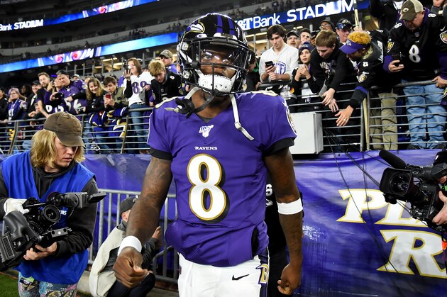 BALTIMORE, MARYLAND - JANUARY 11: Lamar Jackson #8 of the Baltimore Ravens walks on the field prior to playing against the Tennessee Titans in the AFC Divisional Playoff game at M&T Bank Stadium on January 11, 2020 in Baltimore, Maryland. (Photo by Will Newton/Getty Images)
