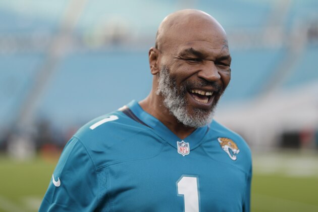 JACKSONVILLE, FLORIDA - SEPTEMBER 19: Mike Tyson looks on before the start of the Tennessee Titans at Jacksonville Jaguars at TIAA Bank Field on September 19, 2019 in Jacksonville, Florida. (Photo by James Gilbert/Getty Images)