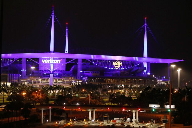 MIAMI GARDENS, FLORIDA - APRIL 09: Part of the Hard Rock Stadium is seen during the Light It Blue initiative on April 09, 2020 in Miami Gardens, Florida. Landmarks and buildings across the nation are displaying blue lights to show support for health care workers and first responders on the front lines of the COVID-19 pandemic.  (Photo by Joe Raedle/Getty Images)