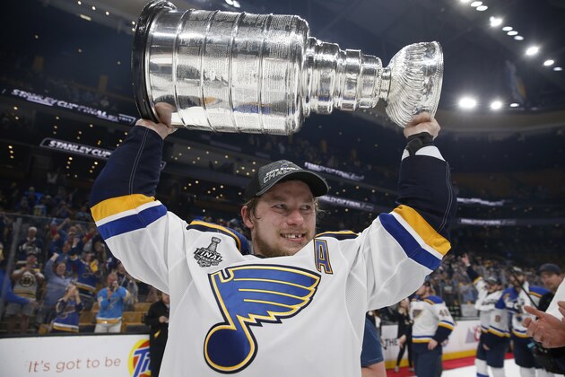 St. Louis Blues' Vladimir Tarasenko, of Russia, carries the Stanley Cup after the Blues defeated the Boston Bruins in Game 7 of the NHL Stanley Cup Final, Wednesday, June 12, 2019, in Boston. (AP Photo/Michael Dwyer)