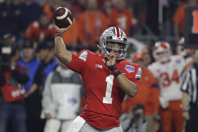 Ohio State quarterback Justin Fields (1) during the first half of the Fiesta Bowl NCAA college football game against Clemson, Saturday, Dec. 28, 2019, in Glendale, Ariz. (AP Photo/Rick Scuteri).