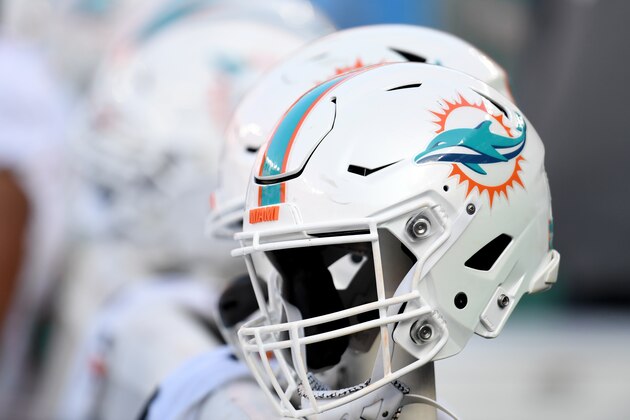 CLEVELAND, OHIO - NOVEMBER 24: A Miami Dolphins helmet on the sidelines during the game between the Miami Dolphins and the Cleveland Browns  at FirstEnergy Stadium on November 24, 2019 in Cleveland, Ohio. (Photo by Jason Miller/Getty Images)