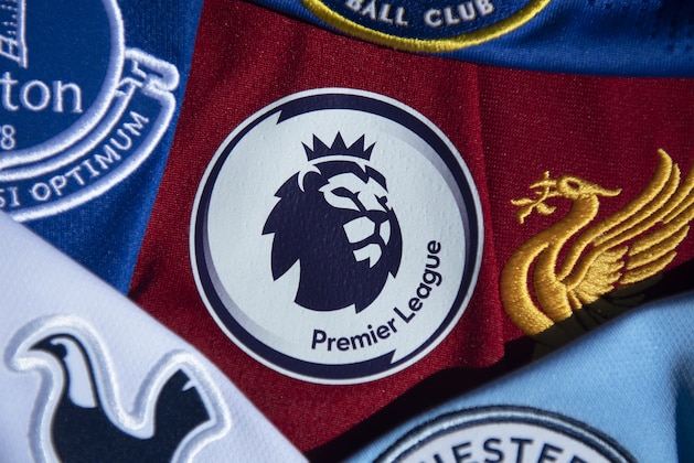 MANCHESTER, ENGLAND - MAY 14: The Premier League logo amongst shirts from Premier League clubs on May 14, 2020 in Manchester, England. (Photo by Visionhaus)