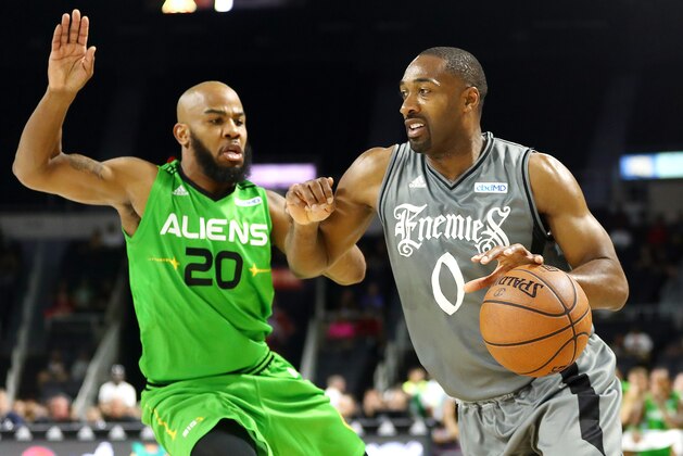 PROVIDENCE, RHODE ISLAND - JULY 13: Gilbert Arenas #0 of the Enemies dribbles against Andre Owens #20 of the Aliens during week four of the BIG3 three on three basketball league at Dunkin' Donuts Center on July 13, 2019 in Providence, Rhode Island. (Photo by Adam Glanzman/BIG3/Getty Images)