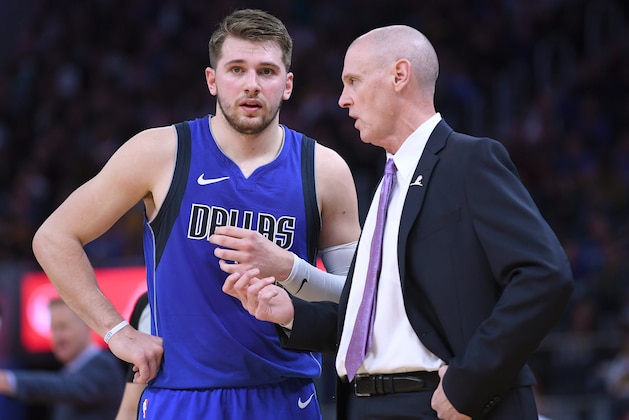 SAN FRANCISCO, CALIFORNIA - DECEMBER 28: Luka Doncic #77 of the Dallas Mavericks talks with head coach Rick Carlisle while there's a break in the action against the Golden State Warriors during the second half of an NBA basketball game at Chase Center on December 28, 2019 in San Francisco, California. NOTE TO USER: User expressly acknowledges and agrees that, by downloading and or using this photograph, User is consenting to the terms and conditions of the Getty Images License Agreement. (Photo by Thearon W. Henderson/Getty Images)