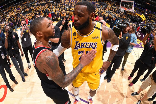 LOS ANGELES, CA - JANUARY 31: LeBron James #23 of the Los Angeles Lakers and Damian Lillard #0 of the Portland Trail Blazers talk after the game on January 31, 2020 at STAPLES Center in Los Angeles, California. NOTE TO USER: User expressly acknowledges and agrees that, by downloading and/or using this Photograph, user is consenting to the terms and conditions of the Getty Images License Agreement. Mandatory Copyright Notice: Copyright 2020 NBAE (Photo by Andrew D. Bernstein/NBAE via Getty Images)