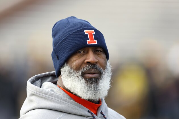 Illinois head coach Lovie Smith walks on the field before an NCAA college football game against Iowa, Saturday, Nov. 23, 2019, in Iowa City, Iowa. (AP Photo/Charlie Neibergall)
