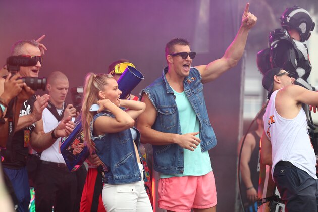 MIAMI, FLORIDA - FEBRUARY 01: Rob Gronkowski and Camille Kostek are seen on stage during