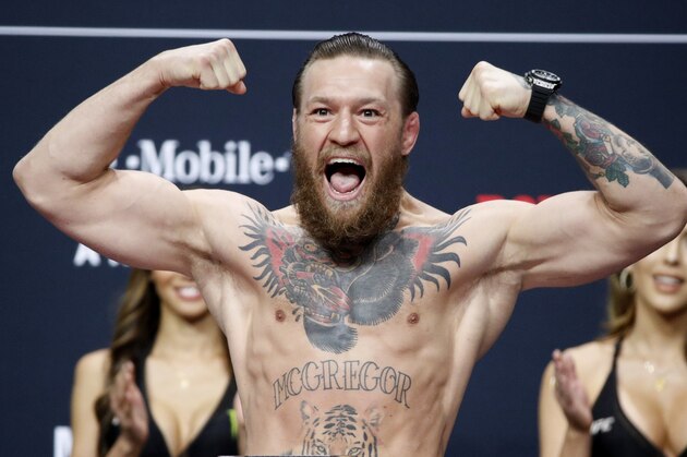 Conor McGregor poses during a ceremonial weigh-in for the UFC 246 mixed martial arts bout, Friday, Jan. 17, 2020, in Las Vegas. McGregor is scheduled to fight Donald