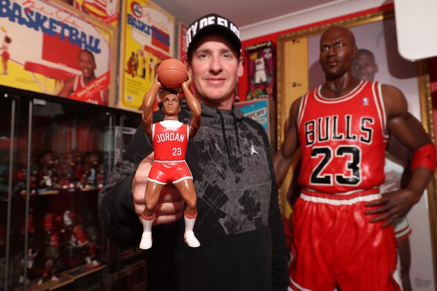 PERTH, AUSTRALIA - MAY 16: Michael Jordan toy historian Joshua De Vaney poses with a rare Ohio Art Lil' Sport Michael Jordan HORSE basketball figure prototype that never went into full production on May 16, 2020 in Perth, Australia. With over 150 different and unique pieces in his collection, Joshua De Vaney has one of the biggest Michael Jordan toy collections in the world. (Photo by Paul Kane/Getty Images)