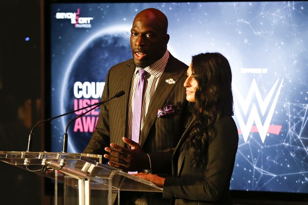 NEW YORK, NY - SEPTEMBER 12: Titus O'Neil and Sonya  Deville of WWE present the Courageous Use of Sport Award at the Beyond Sport Global Awards  on September 12, 2018 in New York City. (Photo by Jeff Zelevansky/Getty Images)