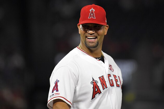 Los Angeles Angels first baseman Albert Pujols smiles during the fifth inning of the team's baseball game against the Boston Red Sox on Friday, Aug. 30, 2019, in Anaheim, Calif. (AP Photo/Mark J. Terrill) Los Angeles Angels first baseman Albert Pujols smiles during the fifth inning of the team's baseball game against the Boston Red Sox on Friday, Aug. 30, 2019, in Anaheim, Calif. (AP Photo/Mark J. Terrill)
