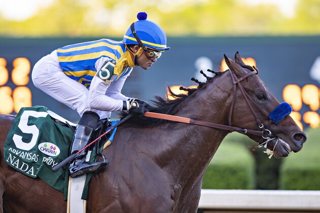 HOT SPRINGS, AR - MAY 02:  Jockey Martin Garcia rides #5 Nadal down the stretch to the win during the 84th running of The Arkansas Derby Grade 2 at Oaklawn Racing Casino Resort on Derby Day during the Covid-19 Pandemic on May 2, 2020 in Hot Springs, Arkansas. (Photo by Wesley Hitt/Getty Images)