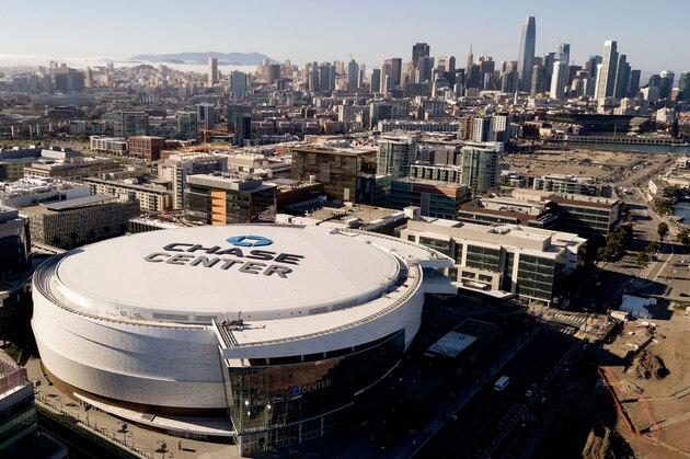 Chase Center, home to the Golden State Warriors, is seen from above in San Francisco California on March 12, 2020. - The NBA suspended its season after a Utah Jazz player tested positive Wednesday for the coronavirus. NBA commissioner Adam Silver said March 12, 2020, the league shut-down because of the coronavirus pandemic is likely to last