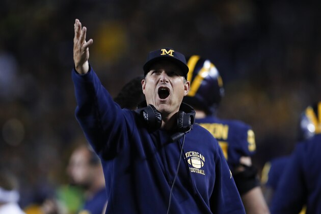 Michigan head coach Jim Harbaugh argues a call against Middle Tennessee in the second half of an NCAA college football game in Ann Arbor, Mich., Saturday, Aug. 31, 2019. (AP Photo/Paul Sancya)