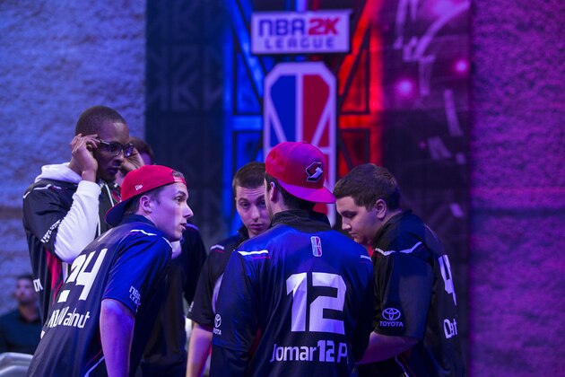 LONG ISLAND CITY, NY - JUNE 30:  Blazer5 Gaming huddles together against Cavs Legion Gaming Club during a game played on June 30, 2018 at the NBA 2K Studio in Long Island City, New York. NOTE TO USER: User expressly acknowledges and agrees that, by downloading and/or using this photograph, user is consenting to the terms and conditions of the Getty Images License Agreement. Mandatory Copyright Notice: Copyright 2018 NBAE (Photo by Michelle Farsi/NBAE via Getty Images)