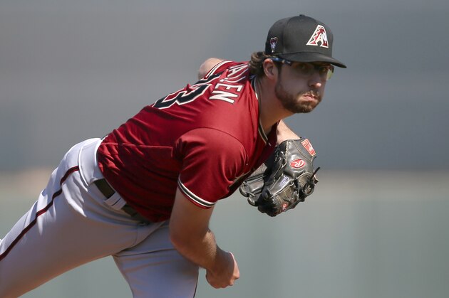Arizona Diamondbacks starting pitcher Zac Gallen follows through on a pitch as he warms up the second inning of a spring training baseball game against the San Francisco Giants Monday, Feb. 24, 2020, in Scottsdale, Ariz. The Giants defeated the Diamondbacks 11-9. (AP Photo/Ross D. Franklin)