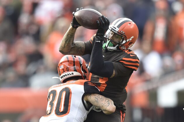 Cleveland Browns wide receiver Odell Beckham Jr. (13) attempts to catch a pass against Cincinnati Bengals free safety Jessie Bates (30) during an NFL football game, Sunday, Dec. 8, 2019, in Cleveland. The Browns won 27-19. (AP Photo/David Richard)