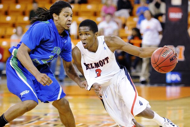 Belmont guard Kerron Johnson (3) drives past Florida Gulf Coast guard Sherwood Brown (25) during the second half of the Atlantic Sun Conference Championship NCAA college basketball game, Saturday, March 3, 2012, in Macon, Ga. Belmont won 83-69. (AP Photo/Jason Vorhees)