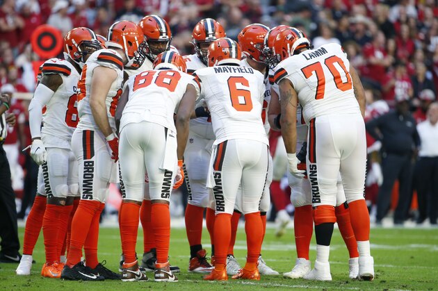 GLENDALE, ARIZONA - DECEMBER 15: Quarterback Baker Mayfield #6 of the Cleveland Browns calls a play in the huddle during the first half of the NFL football game against the Arizona Cardinals at State Farm Stadium on December 15, 2019 in Glendale, Arizona. (Photo by Ralph Freso/Getty Images)