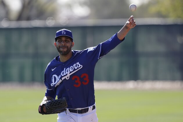 Los Angeles Dodgers pitcher David Price throws during spring training baseball Friday, Feb. 14, 2020, in Phoenix. (AP Photo/Gregory Bull)