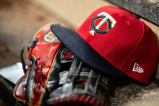 MINNEAPOLIS, MN - AUGUST 03: A Minnesota Twins hat and glove against the Kansas City Royals on August 3, 2019 at the Target Field in Minneapolis, Minnesota. The Twins defeated the Royals 11-3. (Photo by Brace Hemmelgarn/Minnesota Twins/Getty Images) *** Local Caption ***