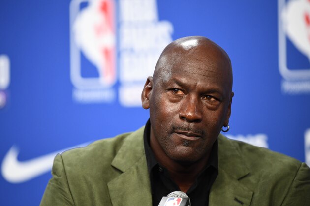 Former NBA star and owner of Charlotte Hornets team Michael Jordan looks on as he addresses a press conference ahead of the NBA basketball match between Milwaukee Bucks and Charlotte Hornets at The AccorHotels Arena in Paris on January 24, 2020. (Photo by FRANCK FIFE / AFP) (Photo by FRANCK FIFE/AFP via Getty Images)