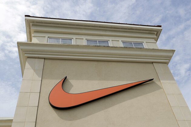 A Nike logo is displayed outside a Nike store in Charlotte, N.C., Tuesday, Sept. 4, 2018. Colin Kaepernick has a new deal with Nike, even without having a job in the NFL. Kaepernick's attorney, Mark Geragos, made the announcement on Twitter, calling the former San Francisco 49ers quarterback an