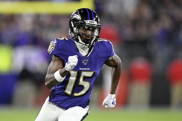 Baltimore Ravens wide receiver Marquise Brown (15) runs on the field during the first half an NFL divisional playoff football game against the Tennessee Titans, Saturday, Jan. 11, 2020, in Baltimore. (AP Photo/Nick Wass)