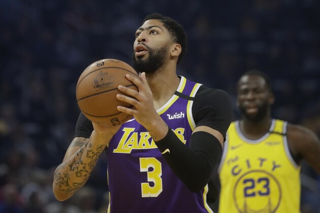 Los Angeles Lakers forward Anthony Davis (3) shoots during an NBA basketball game against the Golden State Warriors in San Francisco, Thursday, Feb. 27, 2020. (AP Photo/Jeff Chiu)