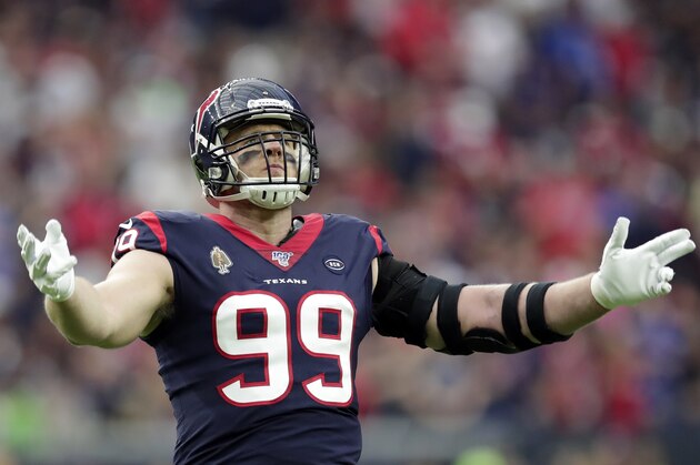 Houston Texans defensive end J.J. Watt (99) encourages the crowd during the first half of an NFL wild-card playoff football game against the Buffalo Bills Saturday, Jan. 4, 2020, in Houston. (AP Photo/Michael Wyke)