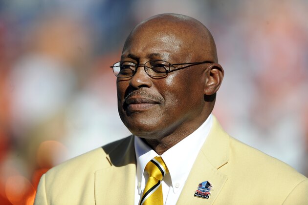 Former Denver Broncos running back Floyd Little speaks during the halftime of an NFL football game between the Indianapolis Colts and the Denver Broncos  Sunday, Sept. 26, 2010, in Denver.  Little was honored for his Hall of Fame induction.(AP Photo/ Jack Dempsey )