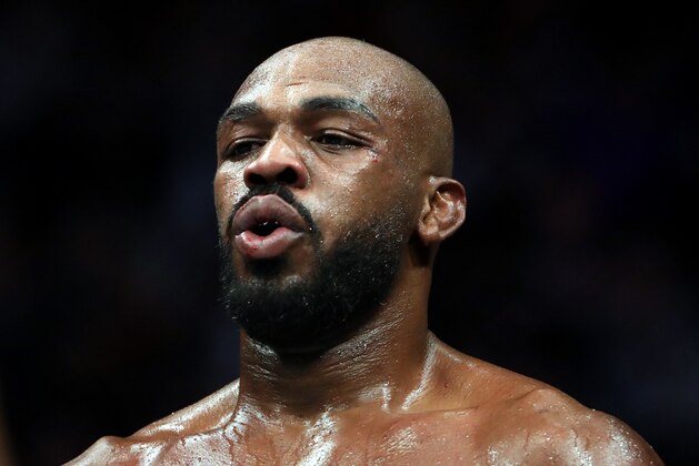 HOUSTON, TEXAS - FEBRUARY 08:  Jon Jones in his fight against Dominick Reyes in their UFC Light Heavyweight Championship bout during UFC 247 at Toyota Center on February 08, 2020 in Houston, Texas. (Photo by Ronald Martinez/Getty Images)