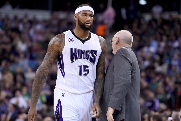 SACRAMENTO, CA - FEBRUARY 20:  DeMarcus Cousins #15 of the Sacramento Kings walks back to the bench past head coach George Karl after Cousins was called for a technical foul against the Boston Celtics in the first quarter at Sleep Train Arena on February 20, 2015 in Sacramento, California. NOTE TO USER: User expressly acknowledges and agrees that, by downloading and or using this photograph, User is consenting to the terms and conditions of the Getty Images License Agreement.  (Photo by Thearon W. Henderson/Getty Images)
