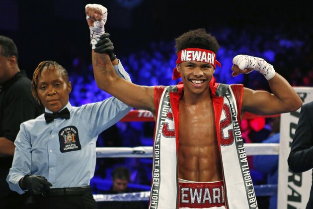 Shakur Stevenson celebrates after defeating Oscar Mendoza during a featherweight boxing match Saturday, Dec. 9, 2017, in New York. (AP Photo/Adam Hunger)