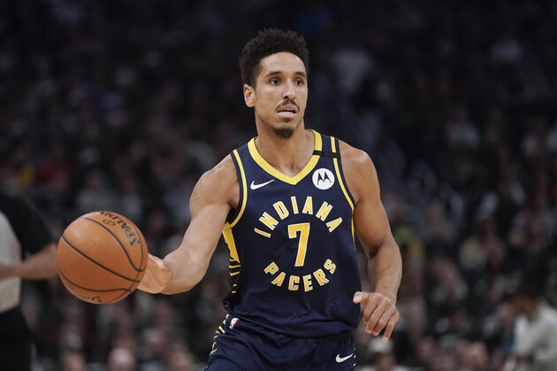 Indiana Pacers' Malcolm Brogdon dribbles during the second half of an NBA basketball game against the Milwaukee Bucks Wednesday, March 4, 2020, in Milwaukee. The Bucks won 119-100. (AP Photo/Morry Gash)