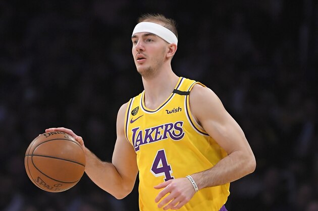 Los Angeles Lakers guard Alex Caruso dribbles during the second half of an NBA basketball game against the San Antonio Spurs Tuesday, Feb. 4, 2020, in Los Angeles. The Lakers won 129-102. (AP Photo/Mark J. Terrill)