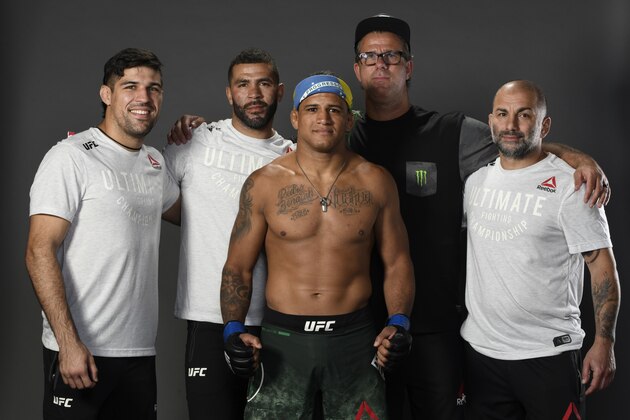 LAS VEGAS, NEVADA - MAY 30:  Gilbert Burns of Brazil poses for a portrait backstage with his team during the UFC Fight Night event at UFC APEX on May 30, 2020 in Las Vegas, Nevada. (Photo by Mike Roach/Zuffa LLC via Getty Images)