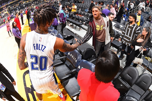 LOS ANGELES, CA - JANUARY 15: NFL Draft Prospect Chase Young high fives Markelle Fultz #20 of the Orlando Magic after the game against the Los Angeles Lakers on January 15, 2020 at STAPLES Center in Los Angeles, California. NOTE TO USER: User expressly acknowledges and agrees that, by downloading and/or using this Photograph, user is consenting to the terms and conditions of the Getty Images License Agreement. Mandatory Copyright Notice: Copyright 2020 NBAE (Photo by Andrew D. Bernstein/NBAE via Getty Images) LOS ANGELES, CA - JANUARY 15: NFL Draft Prospect Chase Young high fives Markelle Fultz #20 of the Orlando Magic after the game against the Los Angeles Lakers on January 15, 2020 at STAPLES Center in Los Angeles, California. NOTE TO USER: User expressly acknowledges and agrees that, by downloading and/or using this Photograph, user is consenting to the terms and conditions of the Getty Images License Agreement. Mandatory Copyright Notice: Copyright 2020 NBAE (Photo by Andrew D. Bernstein/NBAE via Getty Images)