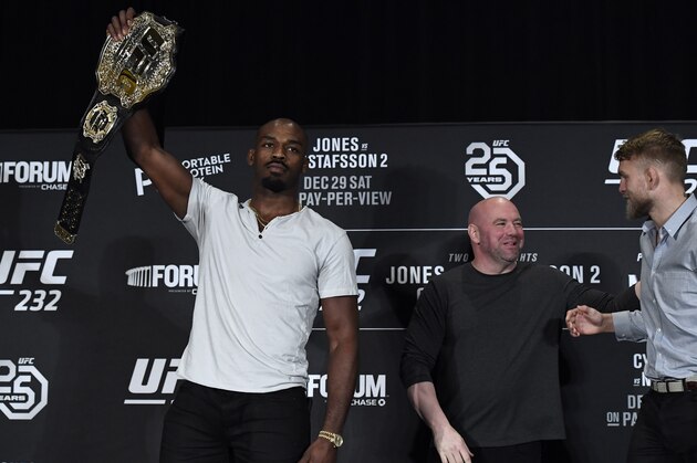 LOS ANGELES, CA - DECEMBER 27: Jon Jones (L) holds up the belt as he poses for the media with UFC President Dana White and opponent Alexander Gustafsson of Sweden looking on during the UFC 232 press conference on December 27, 2018 in Los Angeles, California. (Photo by Kevork Djansezian/Zuffa LLC/Zuffa LLC) LOS ANGELES, CA - DECEMBER 27: Jon Jones (L) holds up the belt as he poses for the media with UFC President Dana White and opponent Alexander Gustafsson of Sweden looking on during the UFC 232 press conference on December 27, 2018 in Los Angeles, California. (Photo by Kevork Djansezian/Zuffa LLC/Zuffa LLC)