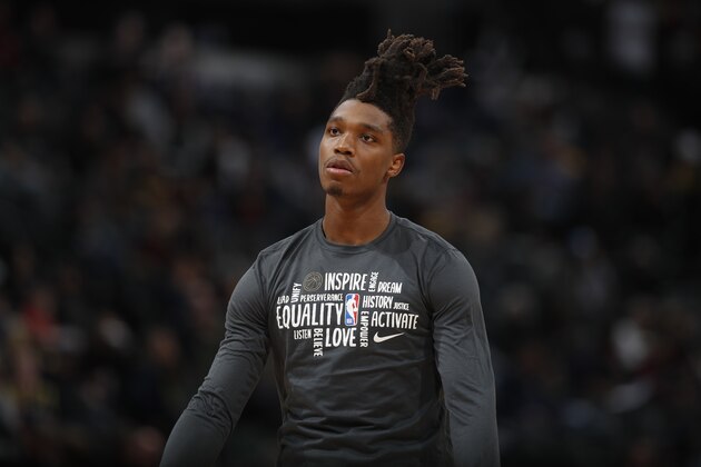 San Antonio Spurs guard Lonnie Walker IV (1) in the second half of an NBA basketball game Monday, Feb.10, 2020, in Denver. The Nuggets won 127-120. (AP Photo/David Zalubowski)