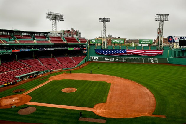 BOSTON, MA - MAY 25: The American flag is dropped over the Green Monster on Memorial Day as the Major League Baseball season is postponed due to the coronavirus pandemic on May 25, 2020 at Fenway Park in Boston, Massachusetts. (Photo by Billie Weiss/Boston Red Sox/Getty Images)