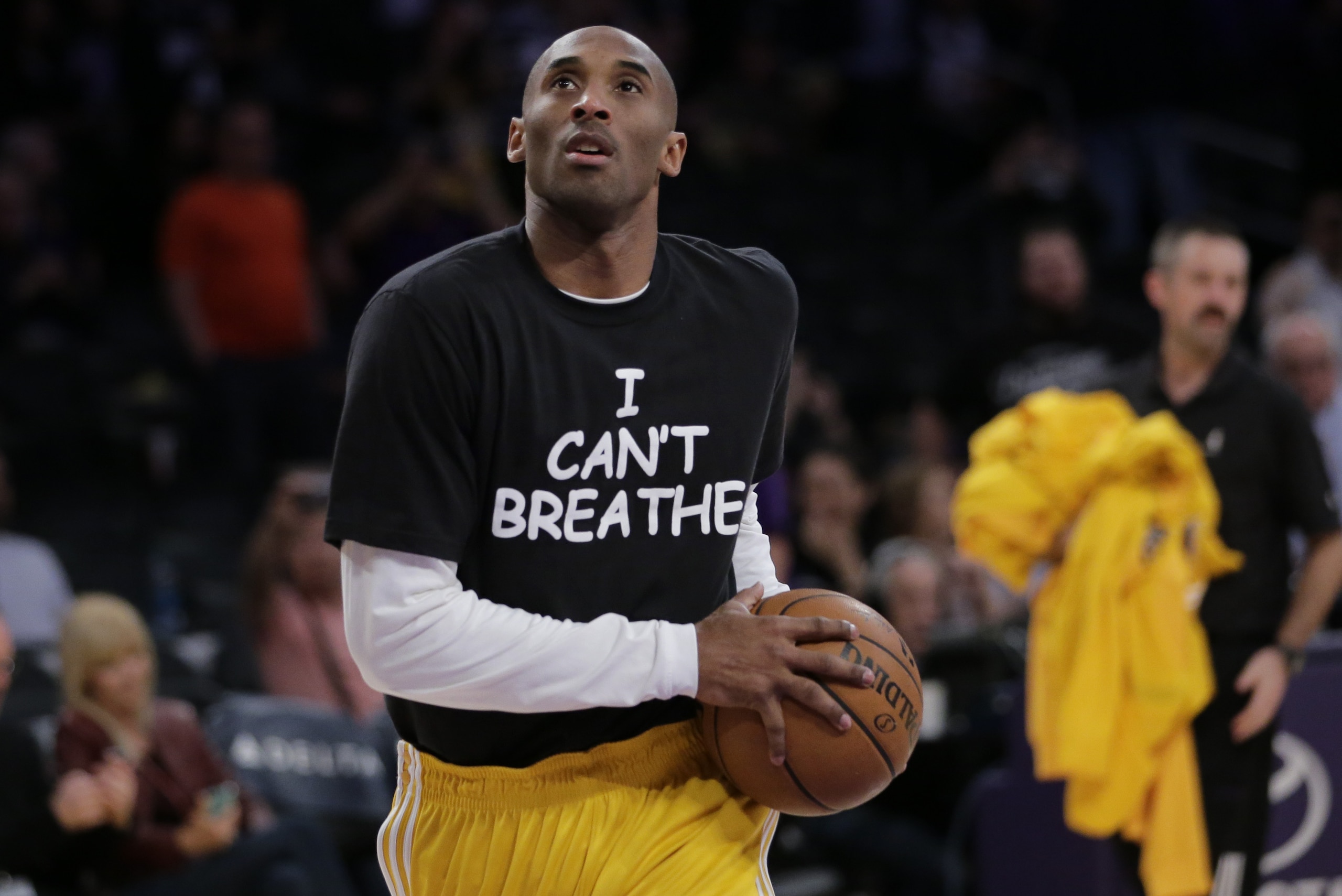 Los Angeles Lakers' Kobe Bryant warms up before an NBA basketball game against the Sacramento Kings, Tuesday, Dec. 9, 2014, in Los Angeles. Several athletes have worn Los Angeles Lakers' Kobe Bryant warms up before an NBA basketball game against the Sacramento Kings, Tuesday, Dec. 9, 2014, in Los Angeles. Several athletes have worn