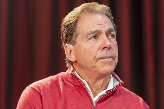 Alabama football coach Nick Saban watches as Alabama quarterback Tua Tagovailoa announces his intentions to declare for the 2020 NFL football draft, Monday, Jan. 6, 2020, in Tuscaloosa, Ala. (AP Photo/Vasha Hunt)
