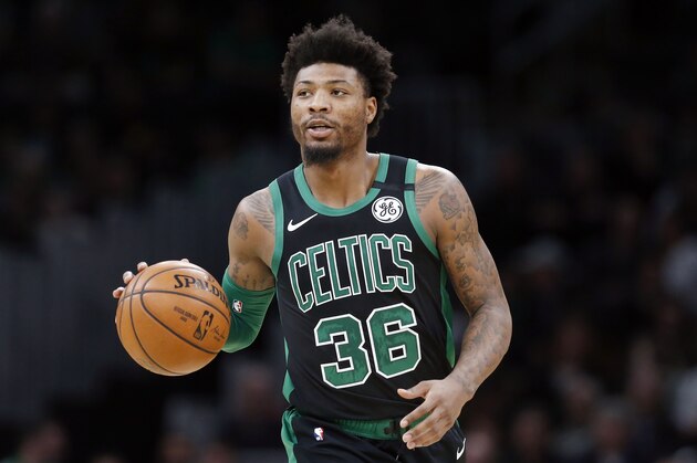 Boston Celtics' Marcus Smart plays against against the Oklahoma City Thunder during an NBA basketball game, Sunday, March, 8, 2020, in Boston. (AP Photo/Michael Dwyer) Boston Celtics' Marcus Smart plays against against the Oklahoma City Thunder during an NBA basketball game, Sunday, March, 8, 2020, in Boston. (AP Photo/Michael Dwyer)