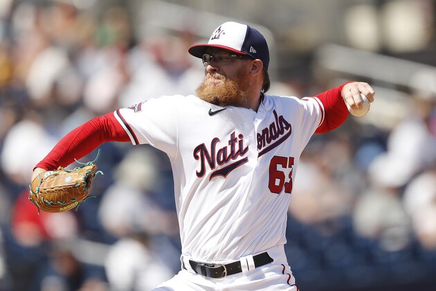 WEST PALM BEACH, FLORIDA - MARCH 12:  Sean Doolittle #63 of the Washington Nationals delivers a pitch against the New York Yankees during a Grapefruit League spring training game at FITTEAM Ballpark of The Palm Beaches on March 12, 2020 in West Palm Beach, Florida. (Photo by Michael Reaves/Getty Images)